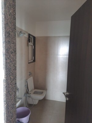 Bathroom in 1 BHK Apartment at Puranik City, Kasarvadavali – for Rent