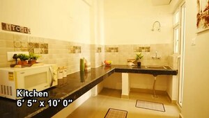 Kitchen in 2.5 BHK Apartment at Ratan Pearls, Sector 16 Greater Noida – for Sale