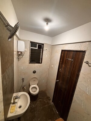 Bathroom in 2 BHK Apartment at Ghatkopar East – for Rent