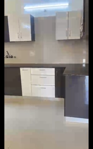 Kitchen in 3 BHK Apartment at Samridhi Luxuriya Avenue, Sector 150 – for Sale