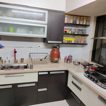 Kitchen in 2.5 BHK Apartment at Triveni Bhoomi Harmony, Kamothe Sector 18 – for Sale