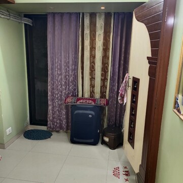 Living Room in 2.5 BHK Apartment at Triveni Bhoomi Harmony, Kamothe Sector 18 – for Sale