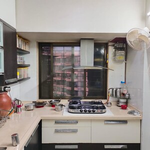 Kitchen in 2.5 BHK Apartment at Triveni Bhoomi Harmony, Kamothe Sector 18 – for Sale