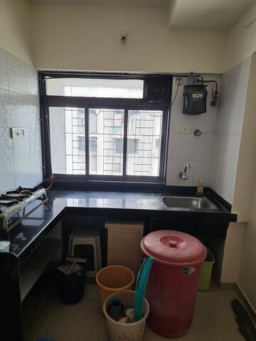 Kitchen in 1.5 BHK Apartment at Andheri East – for Rent