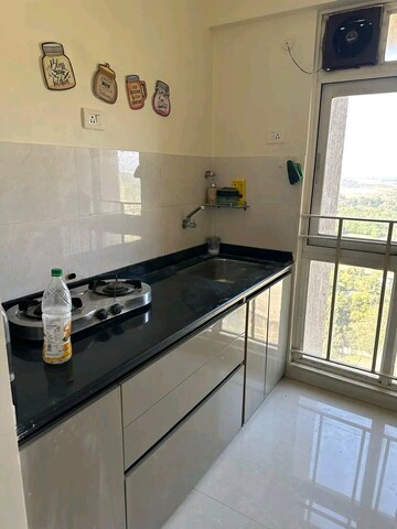 Kitchen in 1 BHK Apartment at Hiranandani Estate, Ghodbunder Road – for Sale