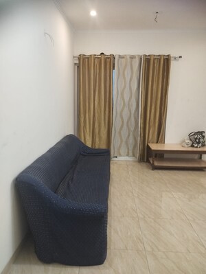 Living Room in 2 BHK Apartment at Gaur Yamuna City, Gaur Yamuna City – for Rent