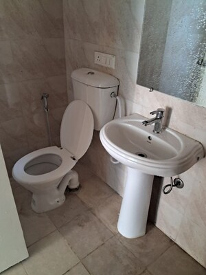 Bathroom in 2 BHK Apartment at Gaur Yamuna City, Gaur Yamuna City – for Rent