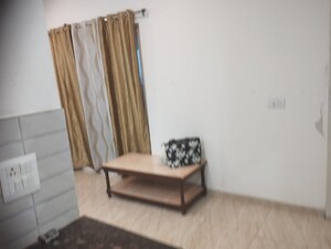 Living Room in 2 BHK Apartment at Gaur Yamuna City, Gaur Yamuna City – for Rent