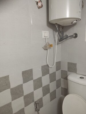 Bathroom in 2 BHK Apartment at Gaur Yamuna City, Gaur Yamuna City – for Rent