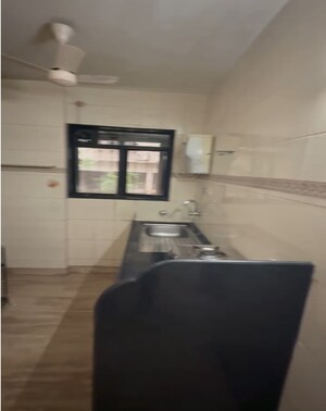 Kitchen in 2 BHK Apartment at Swami Tower, Chembur – for Rent