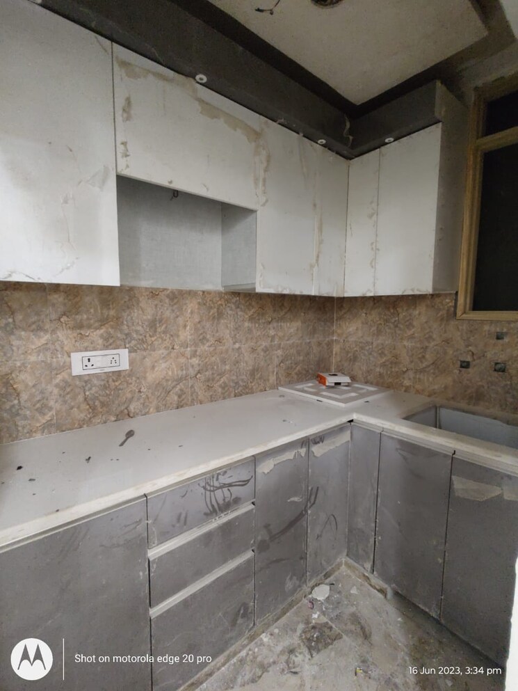 Kitchen, dwarka mor 2 Bedroom 50 Sq.Yd. Builder Floor In Dwarka Mor Delhi 9231586