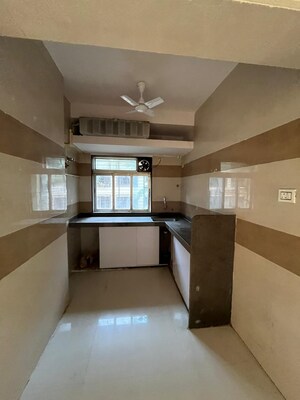 Kitchen in 2 BHK Apartment at Pathan Wadi – for Sale