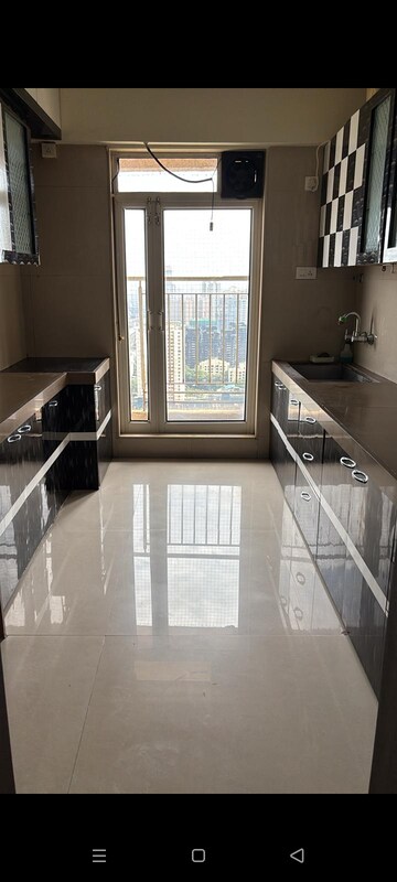 Kitchen in 2 BHK Apartment at Dosti Group Imperia, Manpada – for Rent