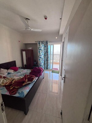 Bedroom in 3 BHK Apartment at Amrapali Golf Homes, Sector 4 Greater Noida – for Rent