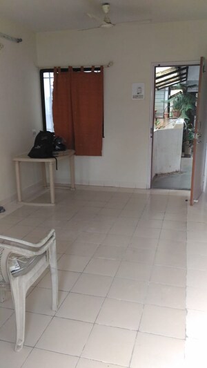 Living Room in 2 BHK Apartment at Madhavbaug Society, Bhusari Colony – for Rent