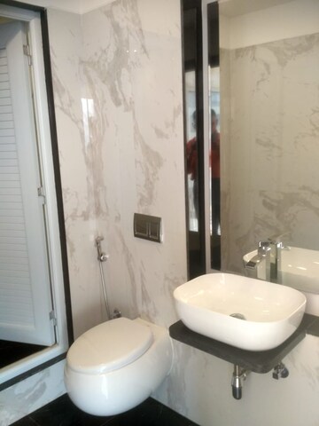 Bathroom in 2 BHK Apartment at Ruparel Ariana, Parel – for Rent