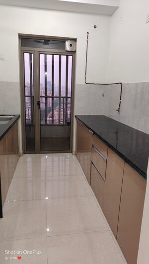 Kitchen in 2 BHK Apartment at Kalpataru Paramount, Kapur Bawdi – for Rent