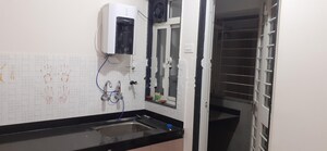 Kitchen in 3 BHK Apartment at Basil Mondale, Mundhwa – for Rent