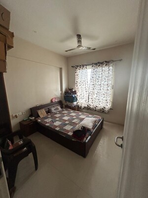 Bedroom in 2 BHK Apartment at Ganga Arcadia, Kharadi – for Rent