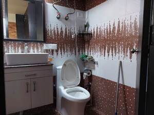 Bathroom in 3 BHK Apartment at Land Craft Golf Links Apartment Phase 2, Pandav Nagar – for Sale