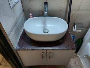 Bathroom in 3 BHK Apartment at Land Craft Golf Links Apartment Phase 2, Pandav Nagar – for Sale