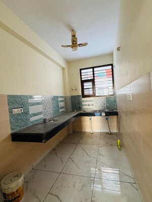 Kitchen in 3 BHK Apartment at Sunny Enclave – for Sale