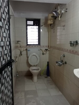 Bathroom in 2 BHK Apartment at Shree Vallabh Tower, Malad West – for Rent