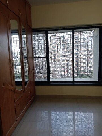 Bedroom in 2 BHK Apartment at Shree Vallabh Tower, Malad West – for Rent