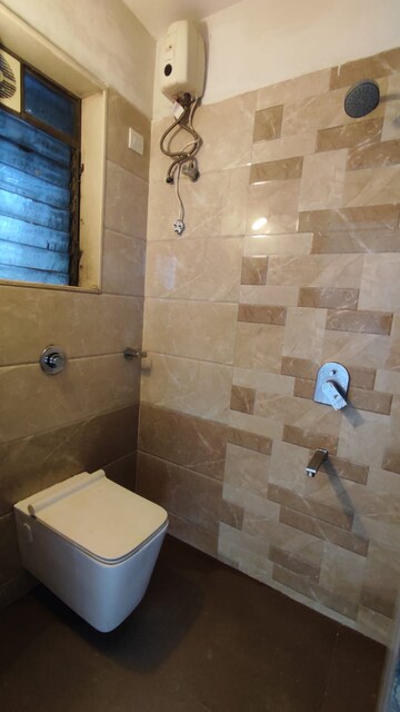 Bathroom in 1 BHK Apartment at Orlem – for Rent