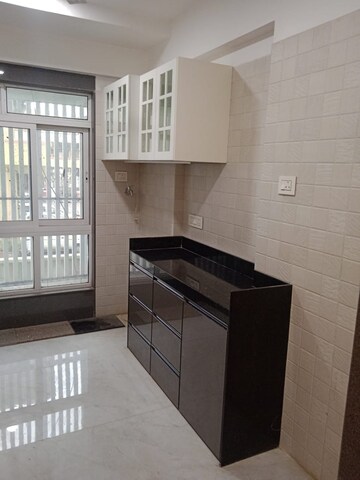 Kitchen in 2 BHK Apartment at Shristi Complex, Andheri East – for Sale