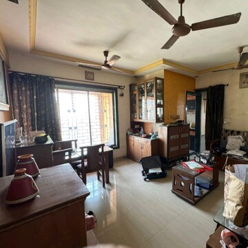 Living Room in 1 BHK Apartment at Vijay Galaxy, Waghbil – for Rent