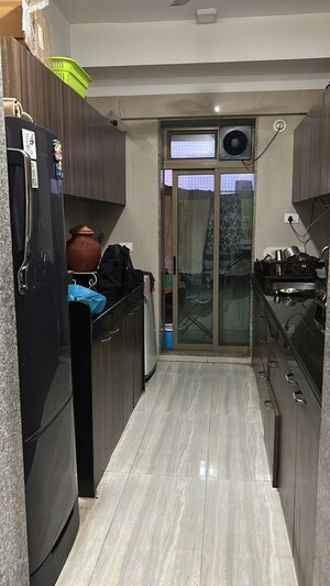 Kitchen in 2 BHK Apartment at Sheth Vasant Oasis, Andheri East – for Rent