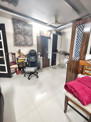 Living Room in 1 BHK Apartment at Balaji Garden CHS, Kopar Khairane – for Sale