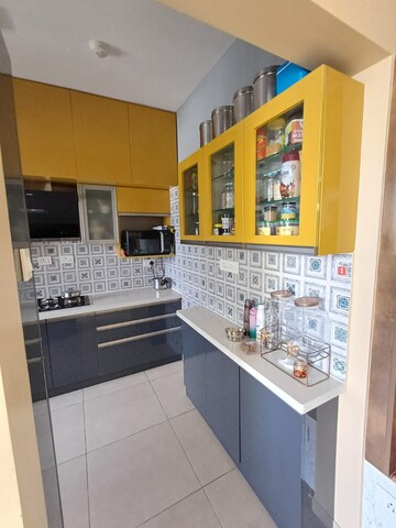 Kitchen in 3 BHK Apartment at Bhartiya Nikoo Homes Phase 2, Thanisandra Main Road – for Sale