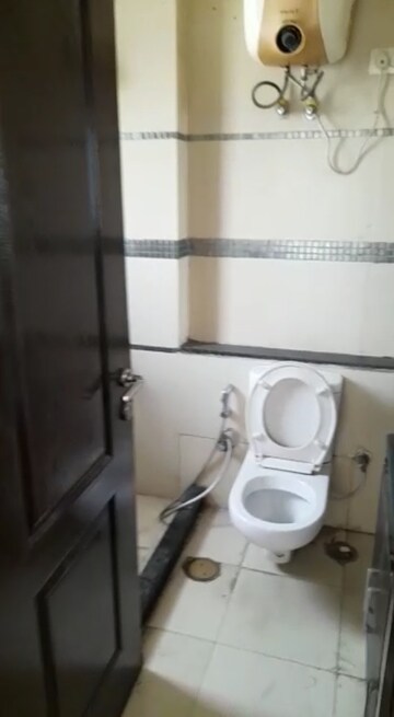 Bathroom in 3 BHK Apartment at Unitech Uniworld Gardens 2, Sector 47 – for Rent