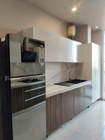 Kitchen in 4 BHK Builder Floor at Vipul Square, Sushant Lok I – for Sale