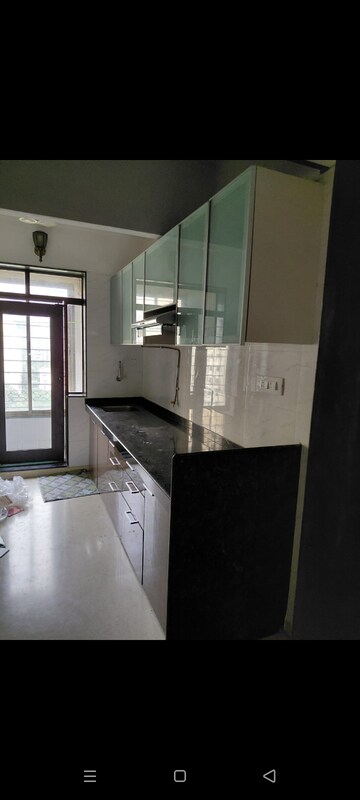 Kitchen in 3 BHK Apartment at Sidhanchal Phase 1, Manpada – for Rent
