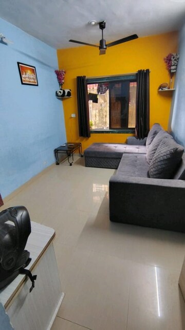 Living Room in 1 BHK Apartment at Vijay Galaxy, Waghbil – for Rent