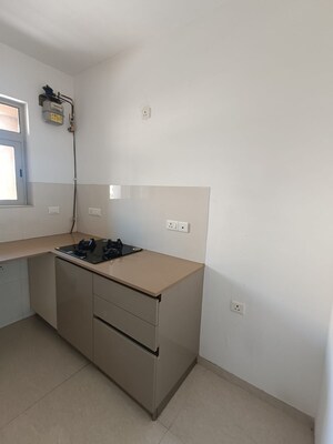 Kitchen in 1 BHK Apartment at Hiranandani Estate Solitaire C, Ghodbunder Road – for Rent