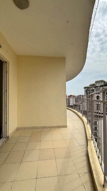 Building Lobby in 2 BHK Apartment at Mahagun Moderne, Sector 78 – for Sale