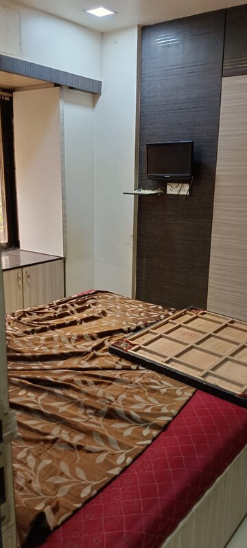 Bedroom in 2 BHK Apartment at Gokul Nagari CHS, Kandivali West – for Rent