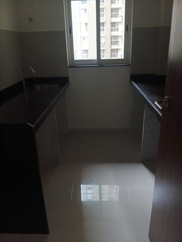 Kitchen in 1 BHK Apartment at Lodha Amara, Kolshet Road – for Rent