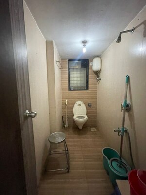 Bathroom in 1 BHK Apartment at Juhu Natraj CHS, Vile Parle West – for Rent