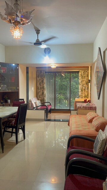 Living Room in 1 BHK Apartment at Juhu Natraj CHS, Vile Parle West – for Rent