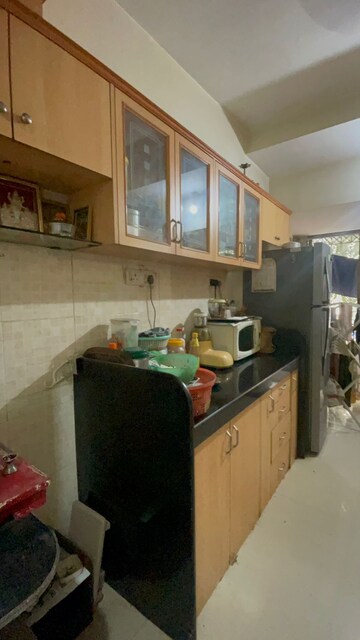 Kitchen in 1 BHK Apartment at Juhu Natraj CHS, Vile Parle West – for Rent