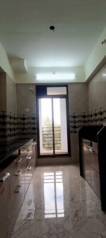 Kitchen in 1 BHK Apartment at Agarwal And Doshi Complex, Vasai West – for Rent