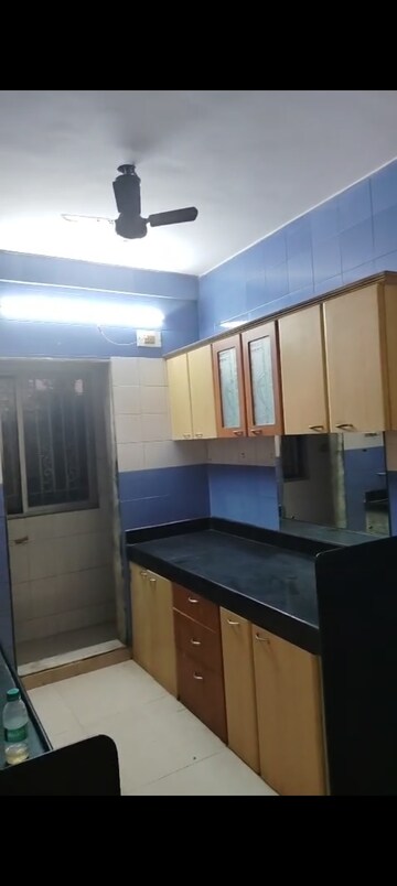 Kitchen in 2 BHK Apartment at New Heritage CHS, Dahisar West – for Sale