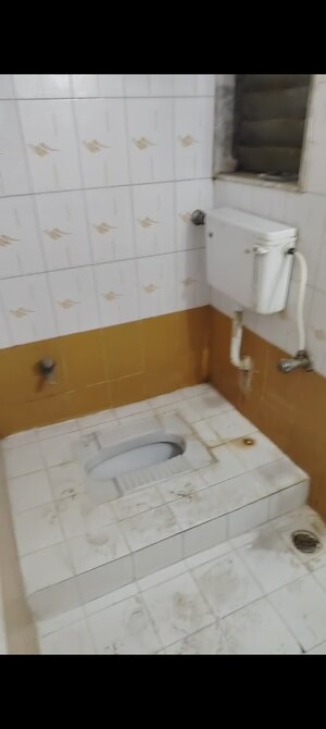 Bathroom in 2 BHK Apartment at New Heritage CHS, Dahisar West – for Sale