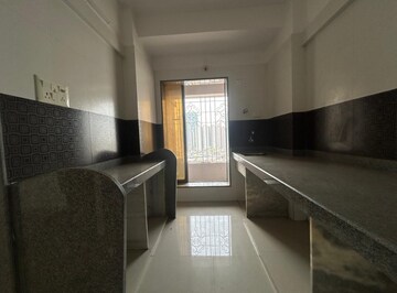 Kitchen in 3 BHK Apartment at Shree Niketan, Kandivali West – for Sale