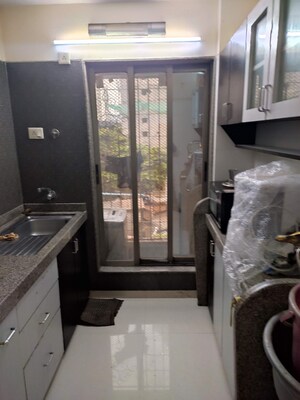 Living Room in 2 BHK Apartment at Shree Niketan, Kandivali West – for Sale